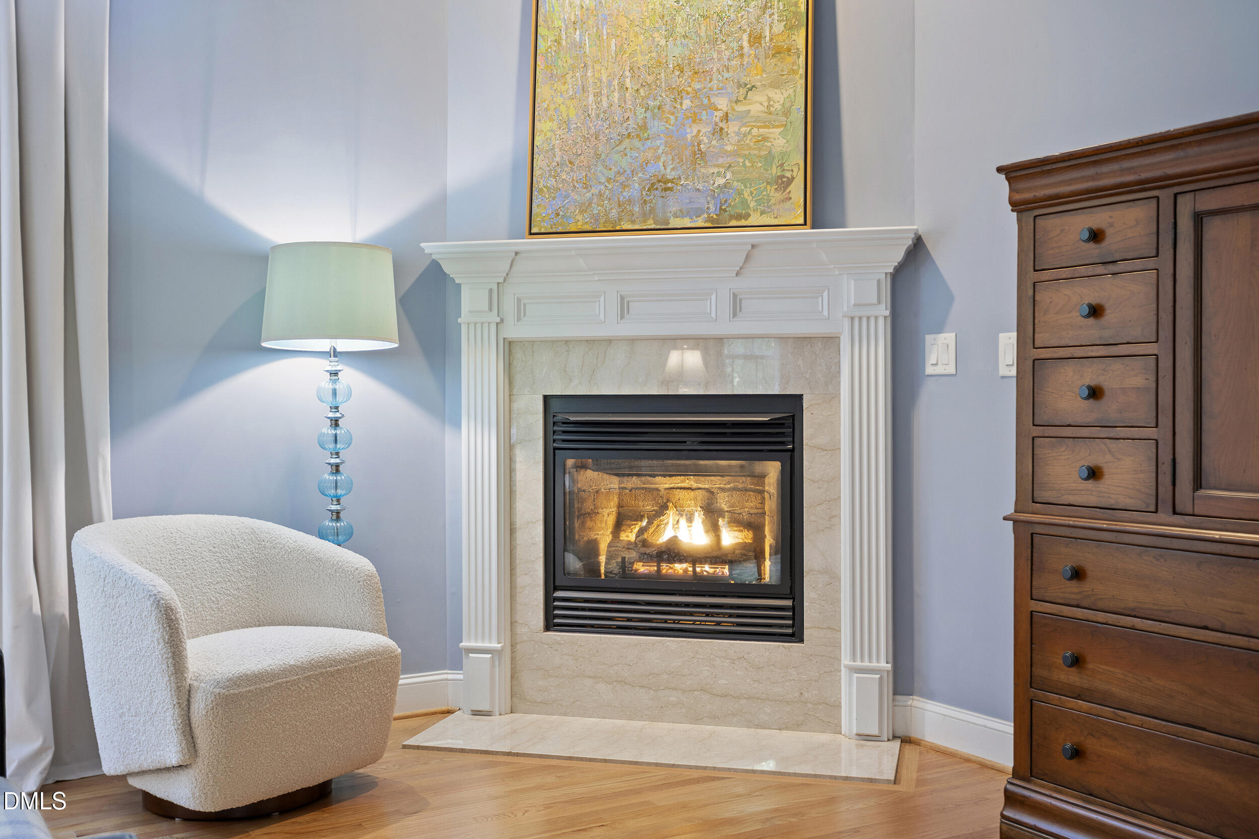 905 Olde Thompson Creek Road Apex, NC 27523 - Photo 36 of 67 a living room with furniture and a fireplace