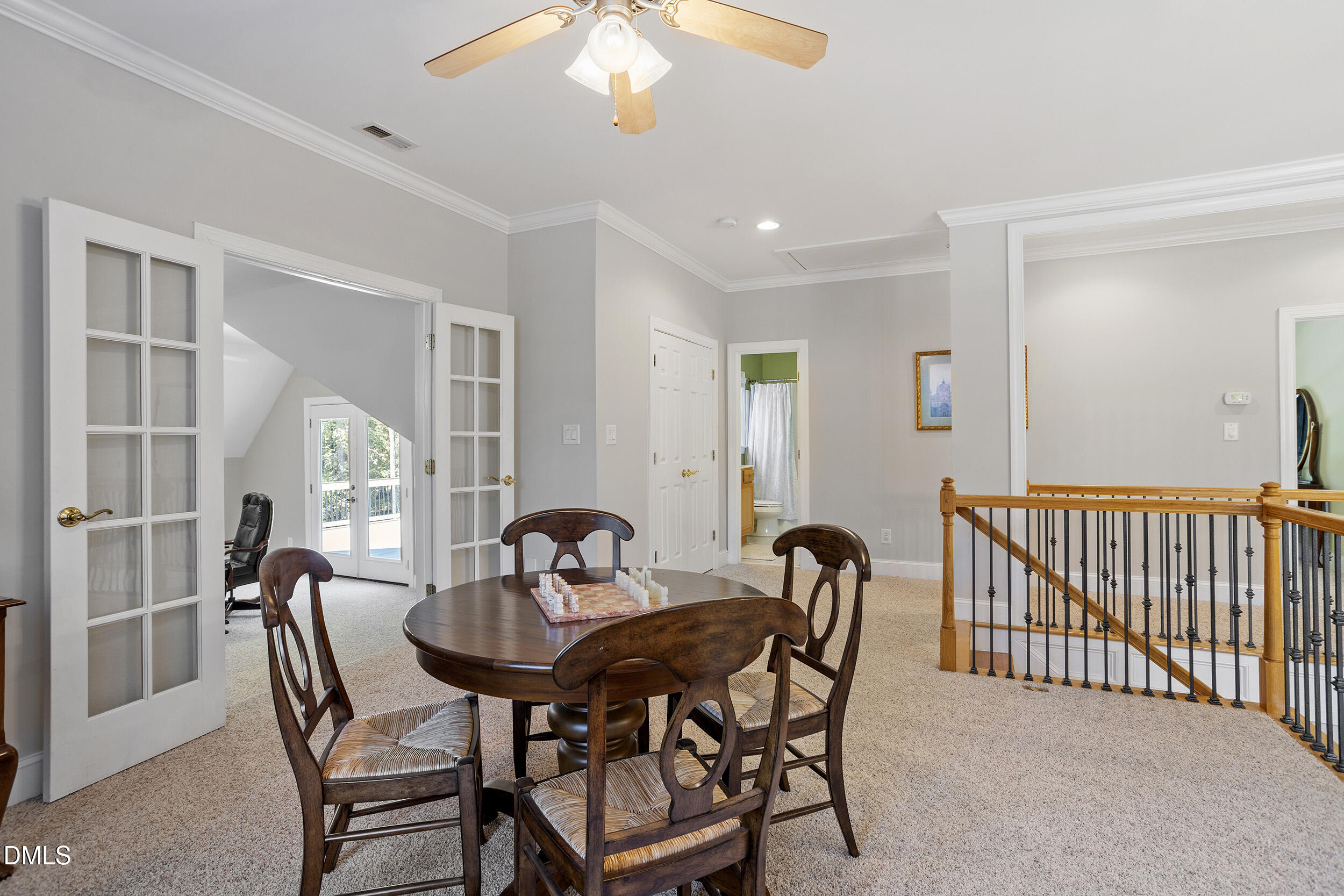 905 Olde Thompson Creek Road Apex, NC 27523 - Photo 43 of 67 a view of a dining room with furniture and window