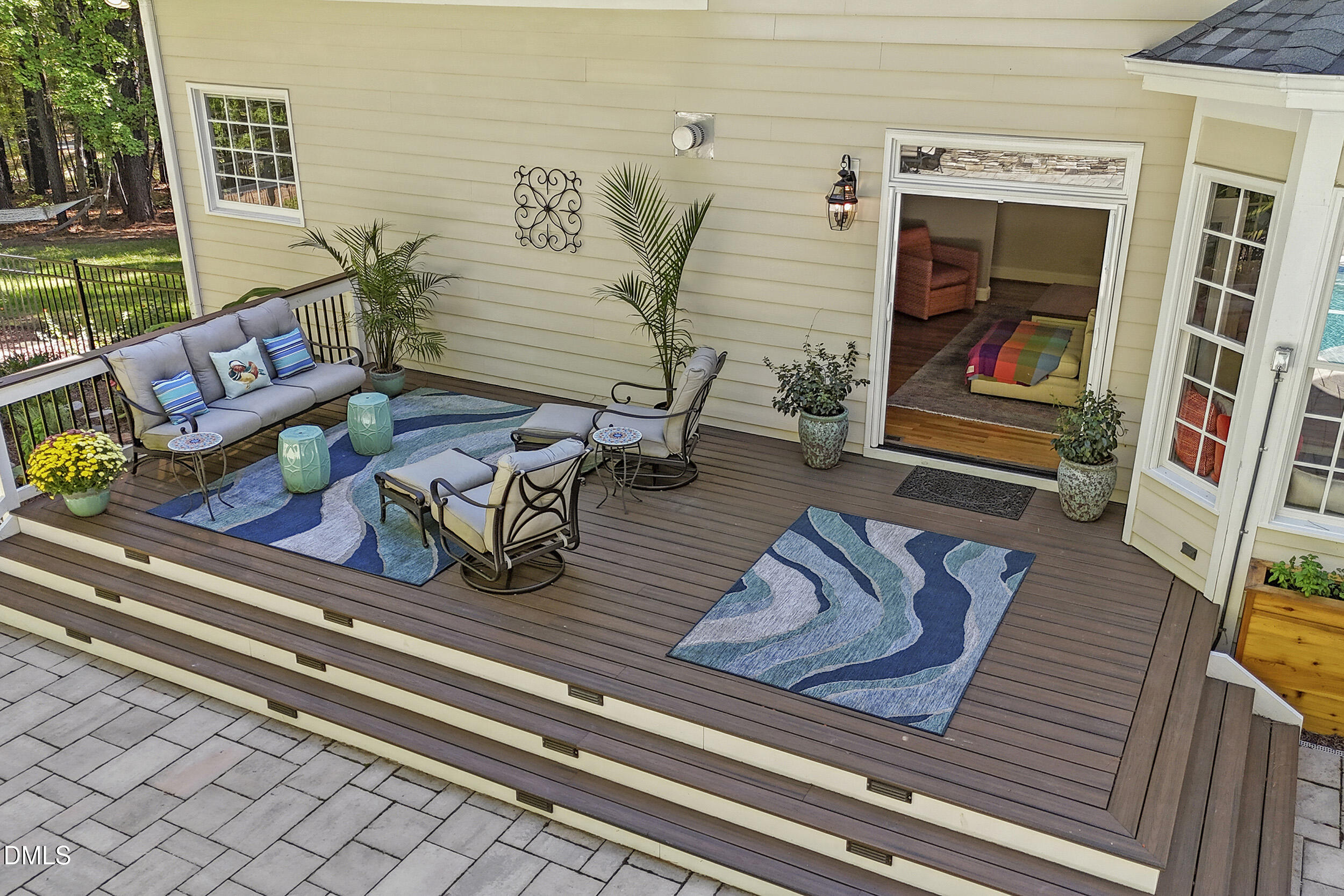 905 Olde Thompson Creek Road Apex, NC 27523 - Photo 59 of 67 a view of living room with furniture and floor to ceiling window