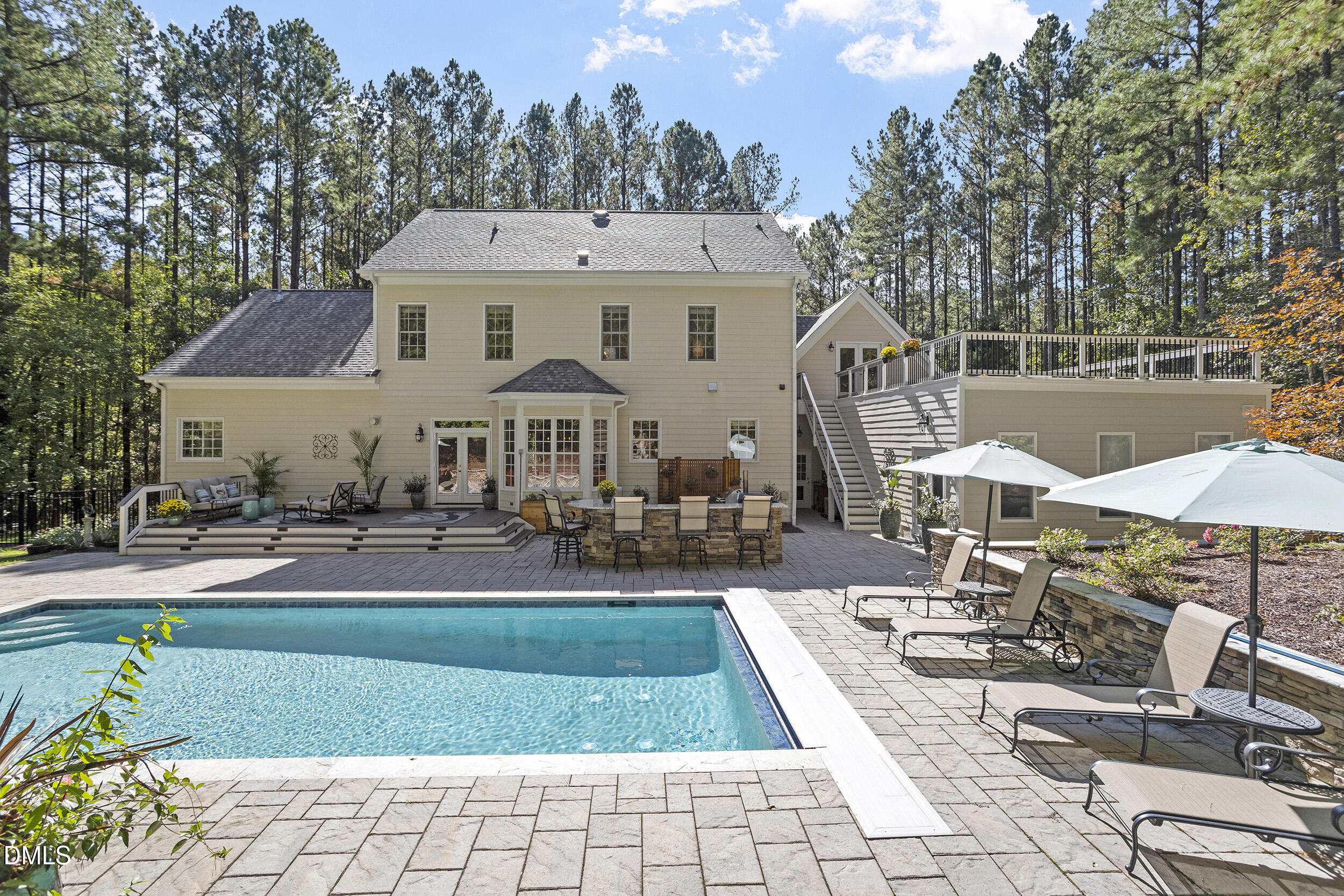 905 Olde Thompson Creek Road Apex, NC 27523 - Photo 6 of 67 a aerial view of a house with swimming pool and patio