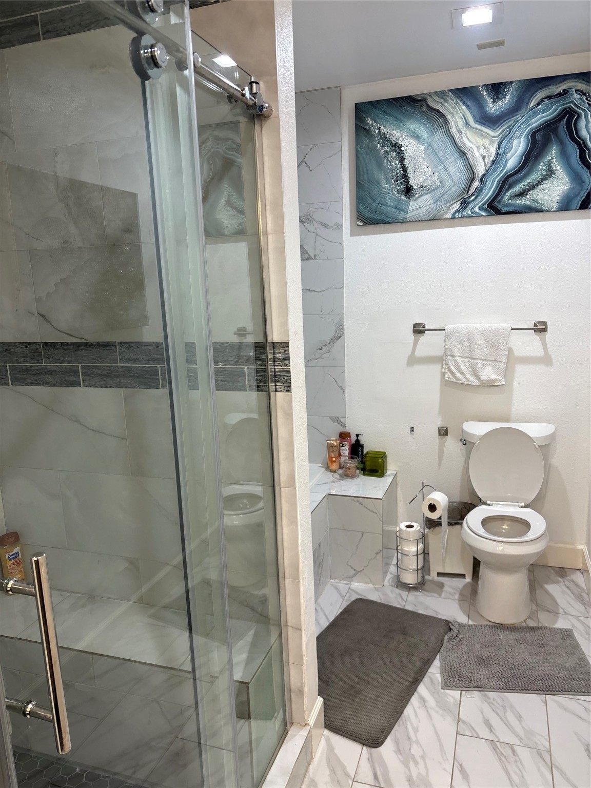 3021 Gray Street Houston, TX 77004 - Photo 17 of 37 a bathroom with a toilet and a shower