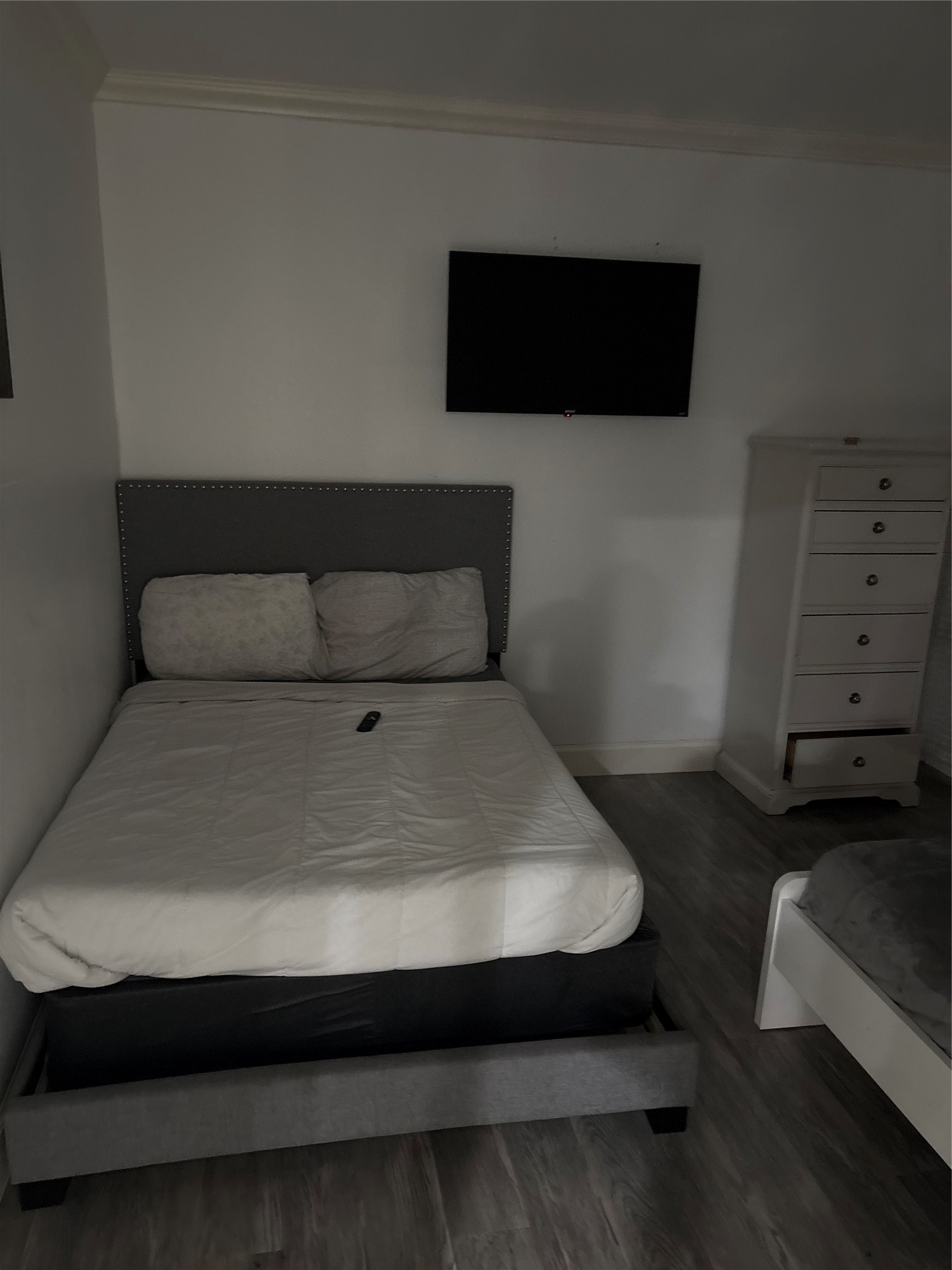 3021 Gray Street Houston, TX 77004 - Photo 18 of 44 a living room with furniture and a flat screen tv