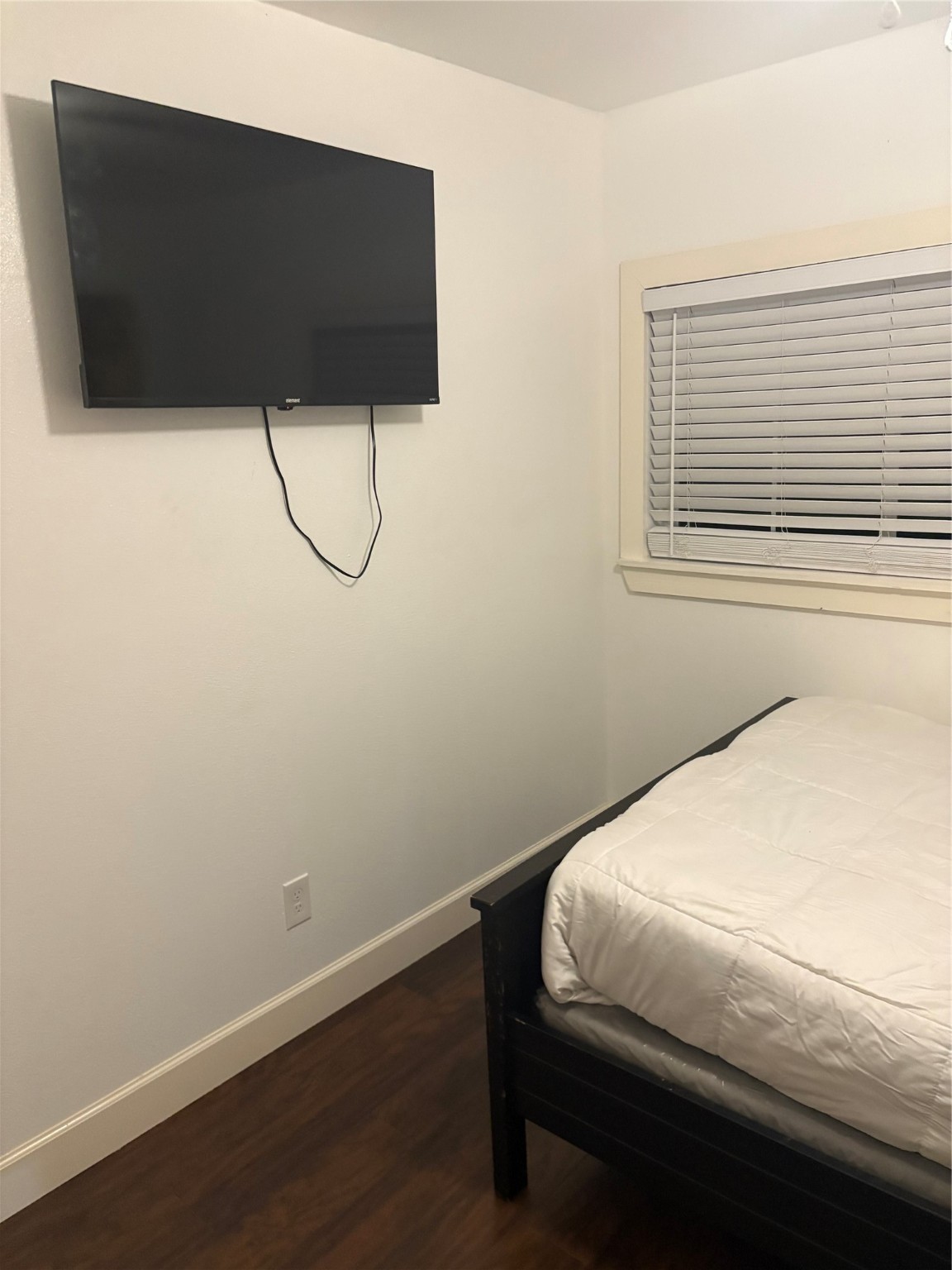 3021 Gray Street Houston, TX 77004 - Photo 25 of 37 a bedroom with a bed and a window