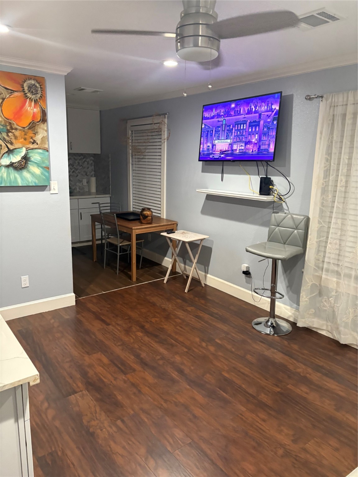 3021 Gray Street Houston, TX 77004 - Photo 31 of 37 a view of a room with furniture screen and wooden floor