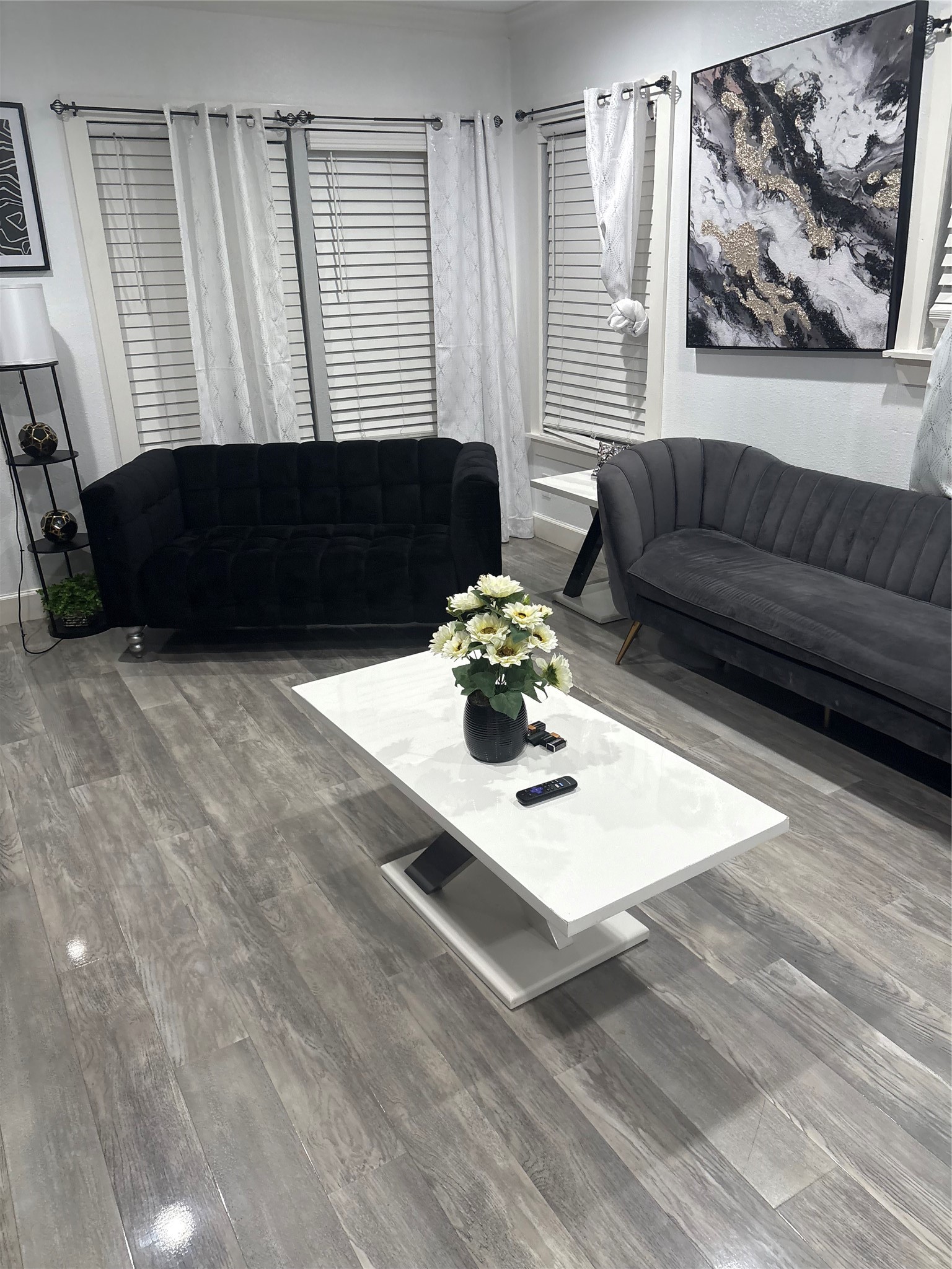 3021 Gray Street Houston, TX 77004 - Photo 32 of 44 a living room with furniture and a large window