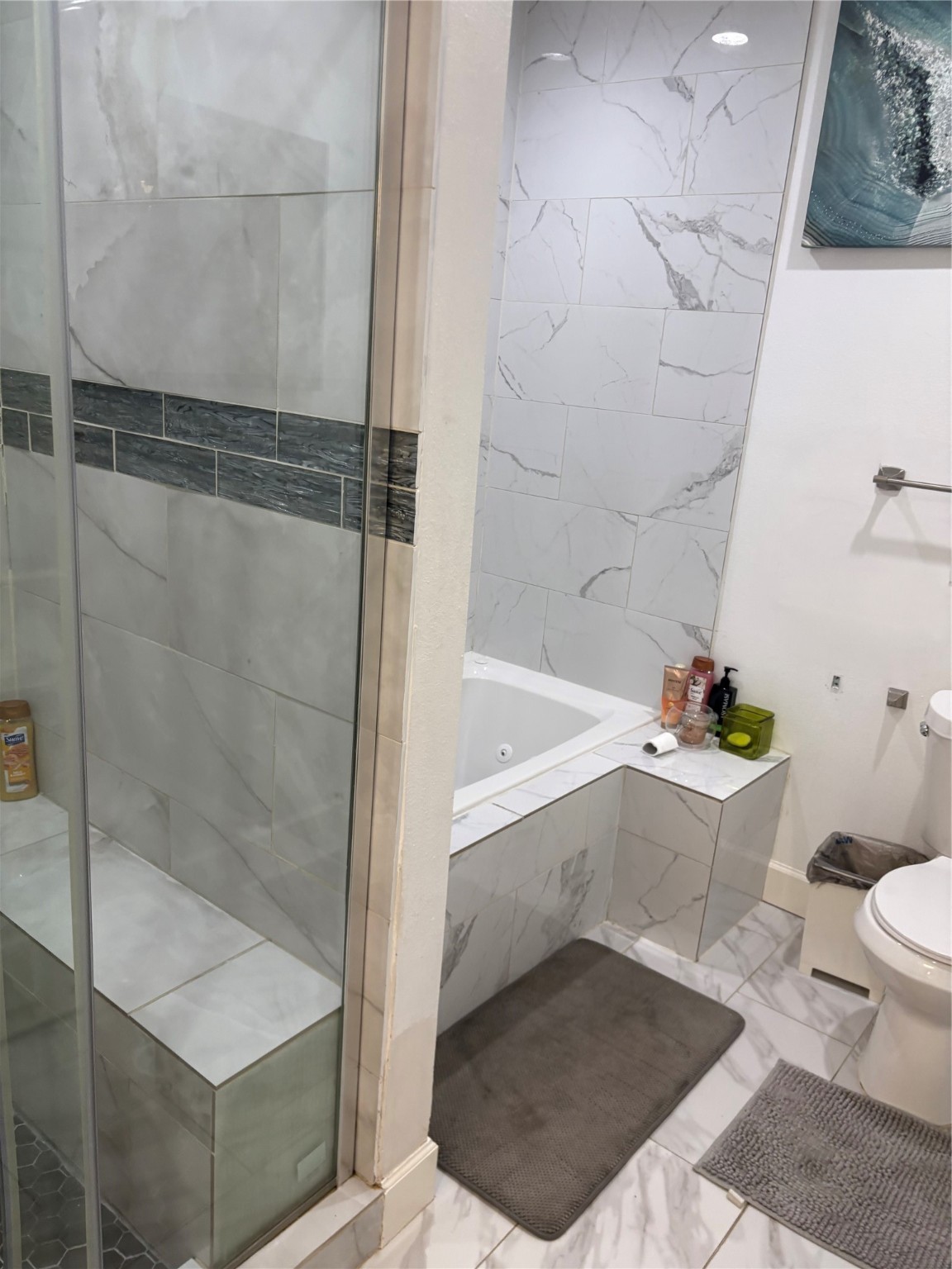 3021 Gray Street Houston, TX 77004 - Photo 32 of 37 a bathroom with a bathtub and a shower