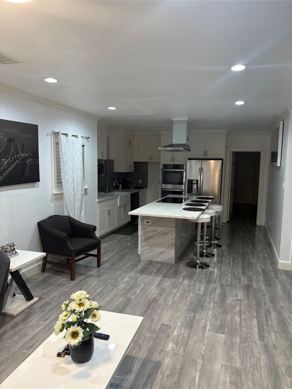 3021 Gray Street Houston, TX 77004 - Photo 35 of 37 a living room with furniture and a couch