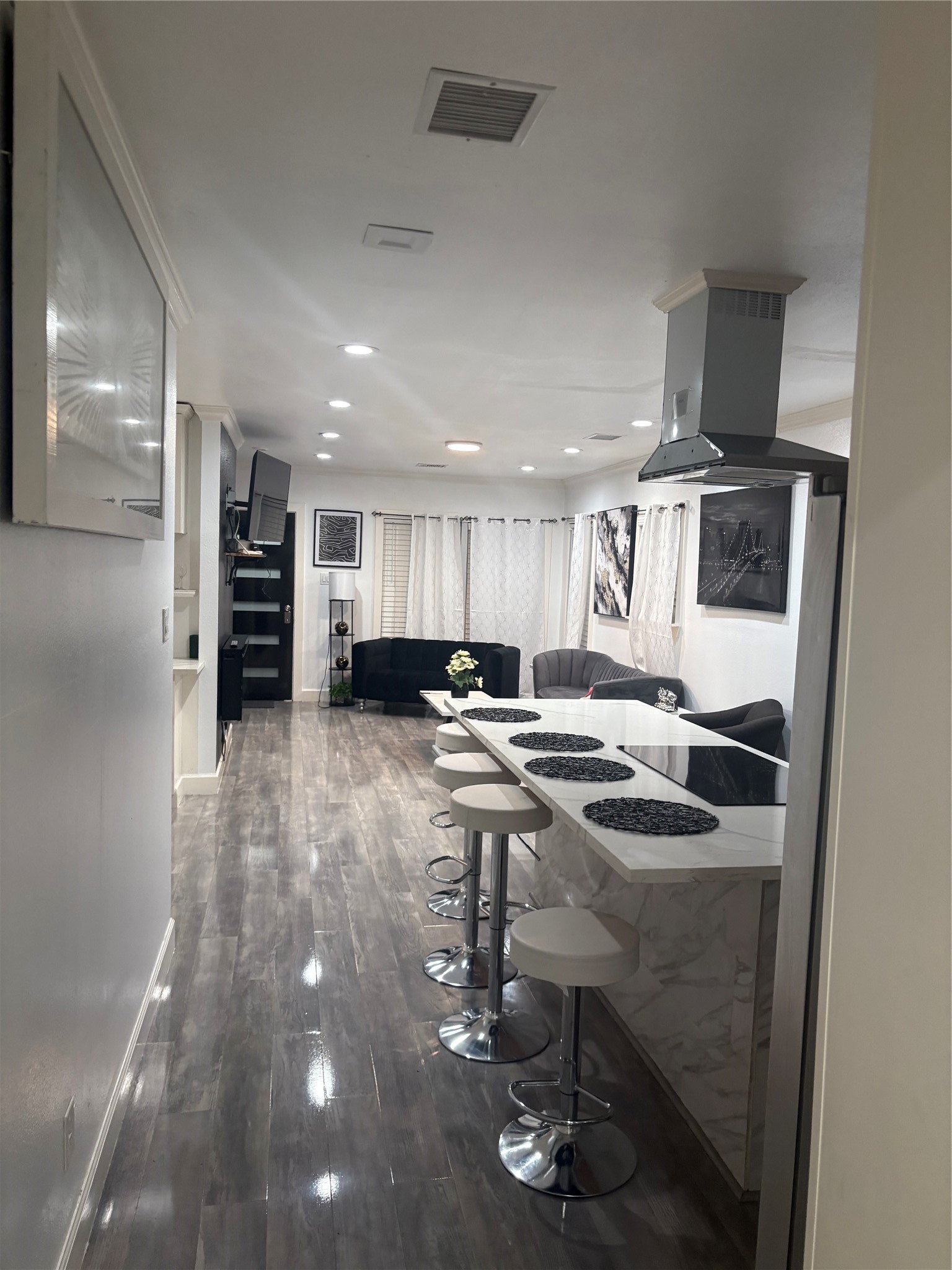 3021 Gray Street Houston, TX 77004 - Photo 37 of 44 a kitchen with stainless steel appliances granite countertop a stove and a refrigerator