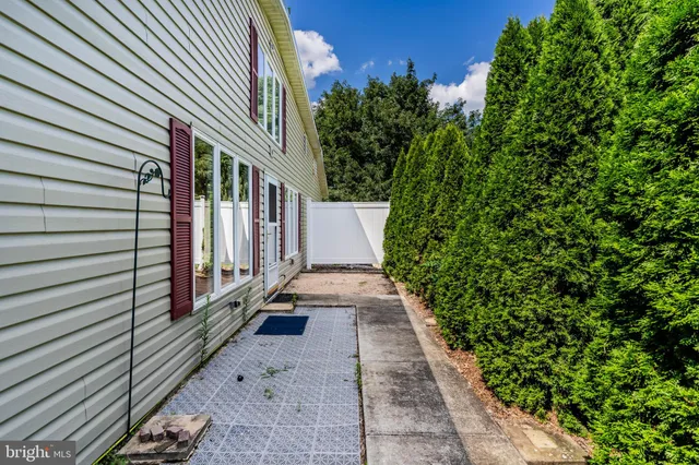 a view of a pathway with a house