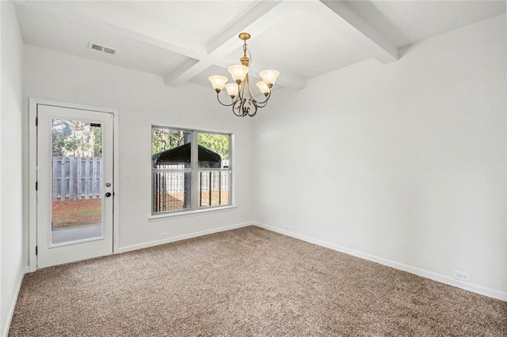 767 Effendi Place Fairburn, GA 30213 - Photo 16 of 35 a view of an empty room with a window