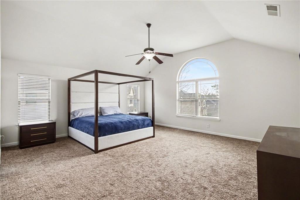 767 Effendi Place Fairburn, GA 30213 - Photo 27 of 35 a bedroom with a bed and a window