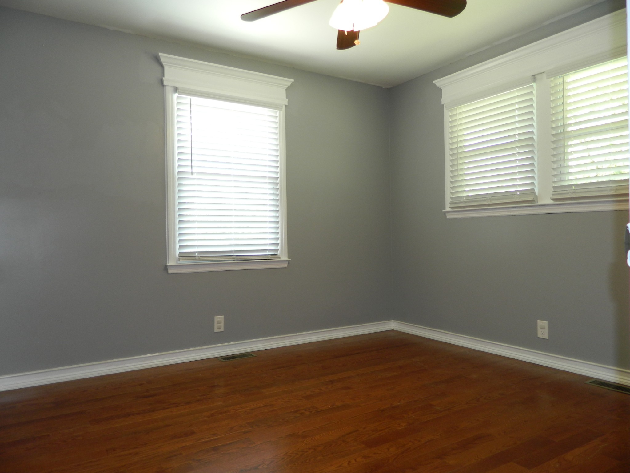 2128 Sanders Road Clarksville, TN 37043 - Photo 16 of 21 a view of a room with wooden floor and windows in it