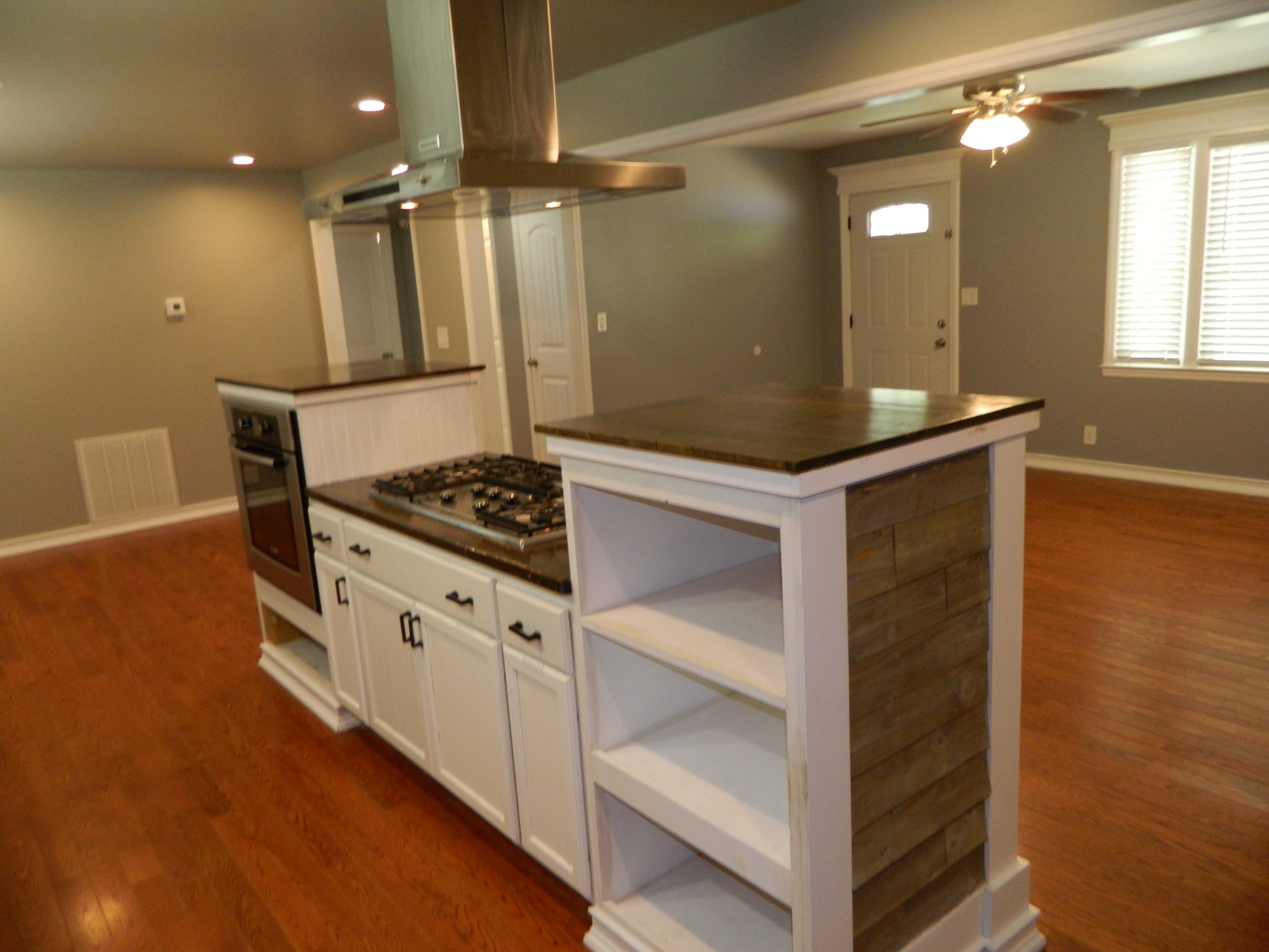 2128 Sanders Road Clarksville, TN 37043 - Photo 4 of 21 a kitchen with white cabinets and sink