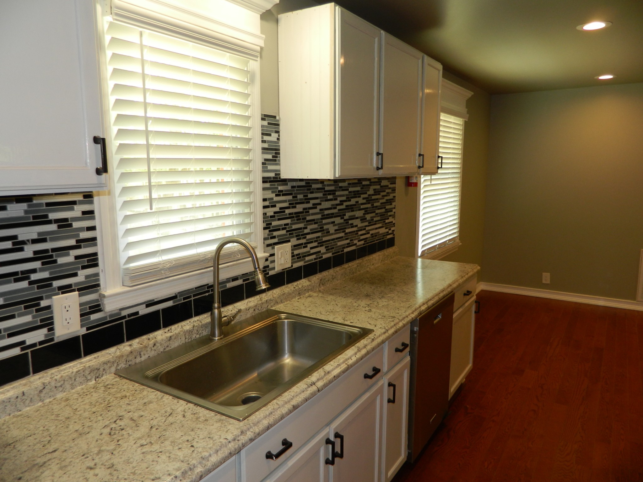 2128 Sanders Road Clarksville, TN 37043 - Photo 7 of 21 a kitchen that has a sink and a stove