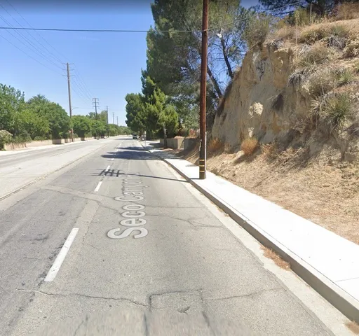 a view of a yard with an outdoor space