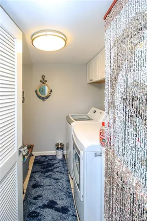a hallway with a stove top oven