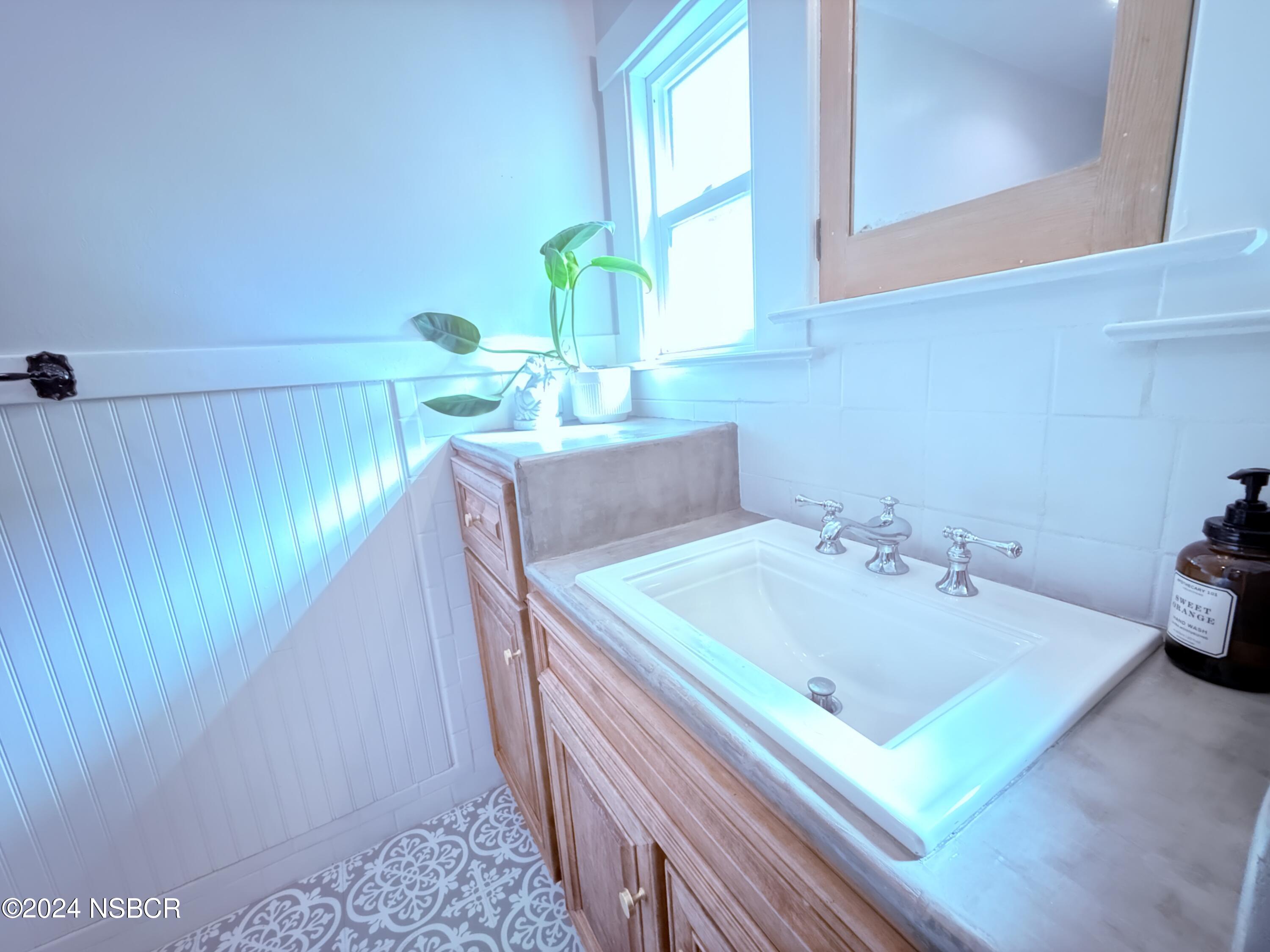 Undisclosed Address Buellton, CA 93427 - Photo 17 of 41 a bathroom with a sink and a mirror