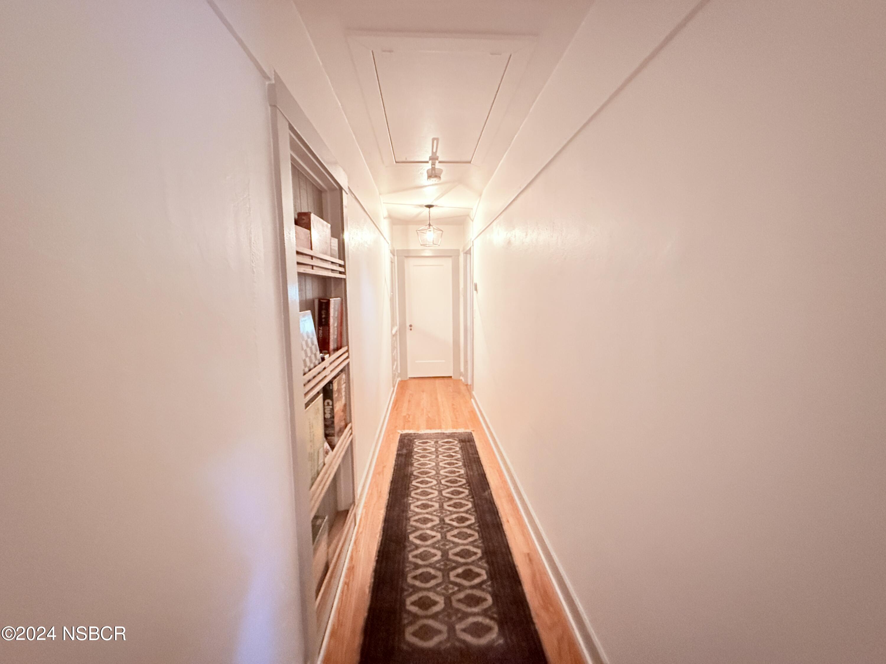 Undisclosed Address Buellton, CA 93427 - Photo 18 of 41 a view of a hallway with windows