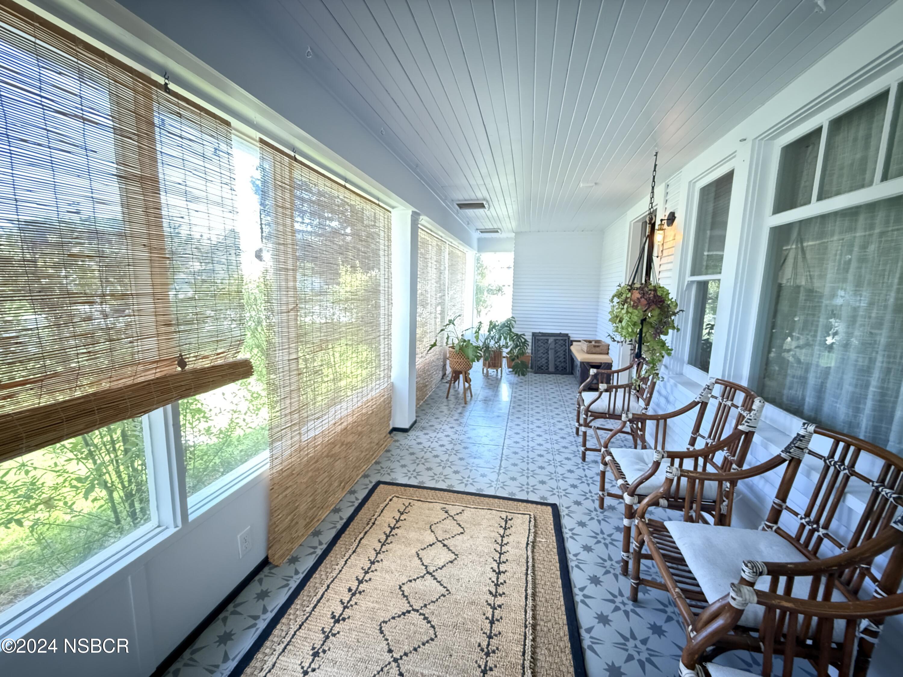 Undisclosed Address Buellton, CA 93427 - Photo 3 of 41 a living room with furniture and a large window