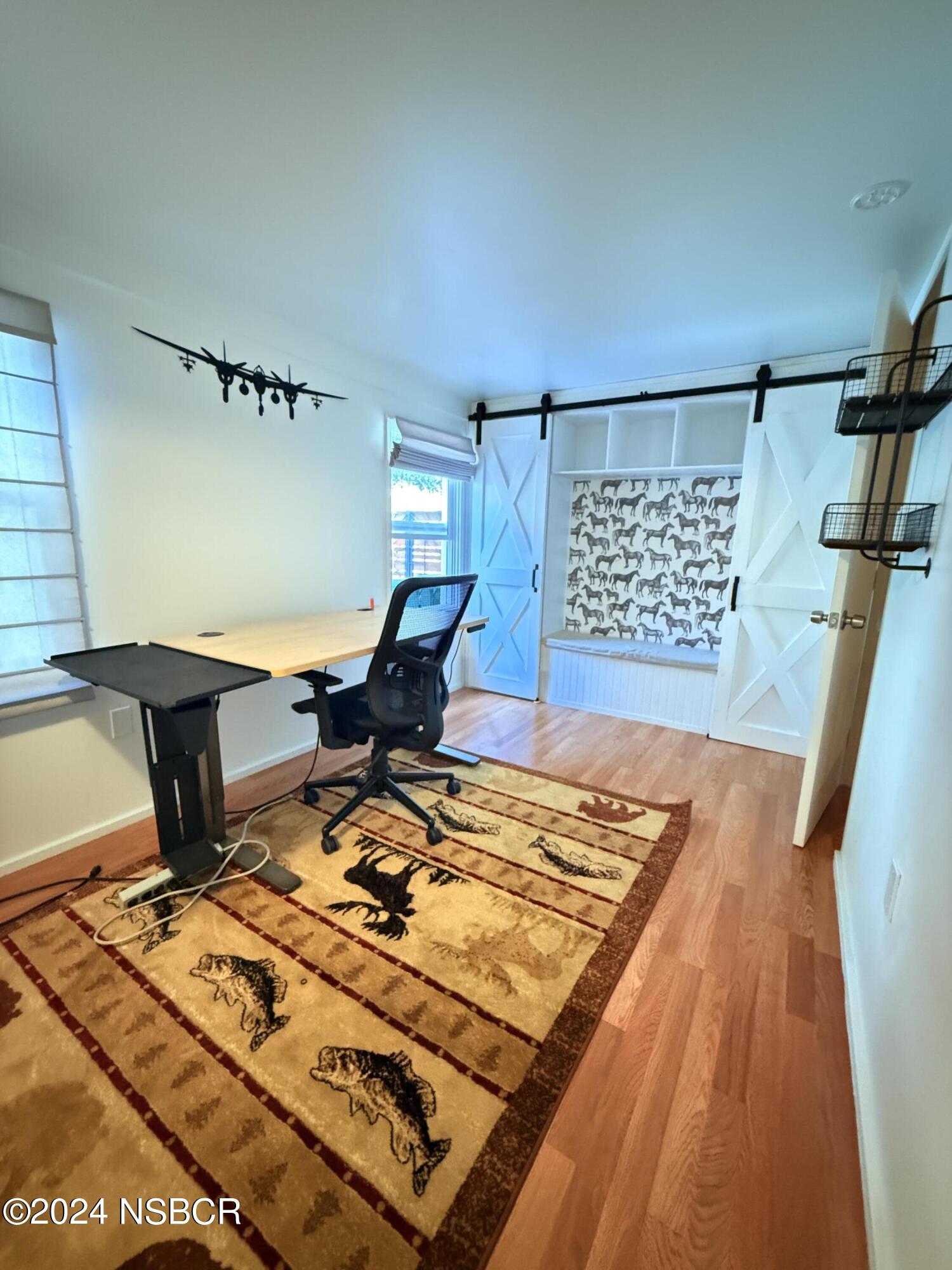 Undisclosed Address Buellton, CA 93427 - Photo 10 of 41 a living room with a rug