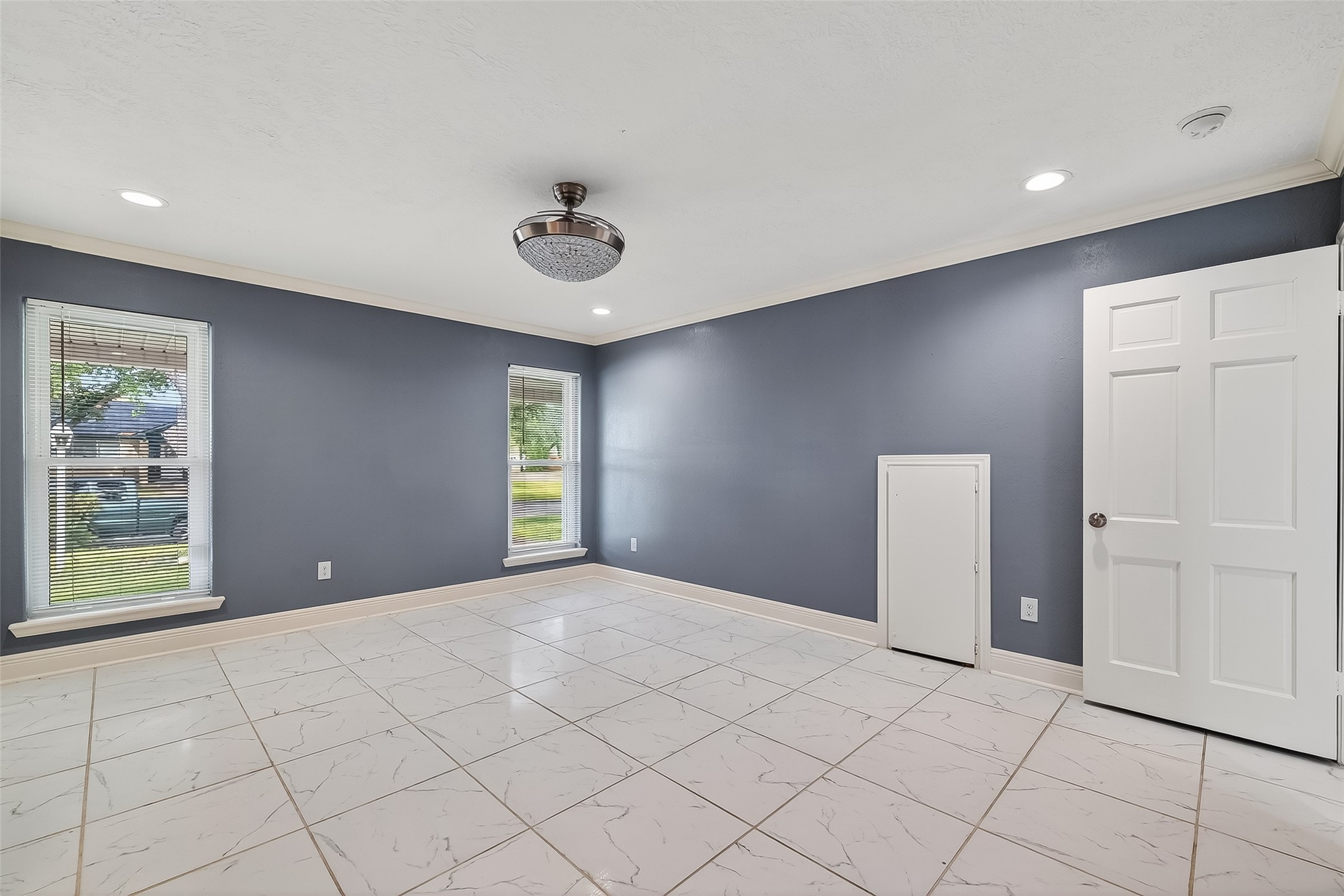 4901 Burning Tree Drive Baytown, TX 77521 - Photo 25 of 47 a view of an empty room with a window