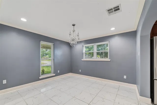 a bathroom with a granite countertop sink toilet a mirror and shower