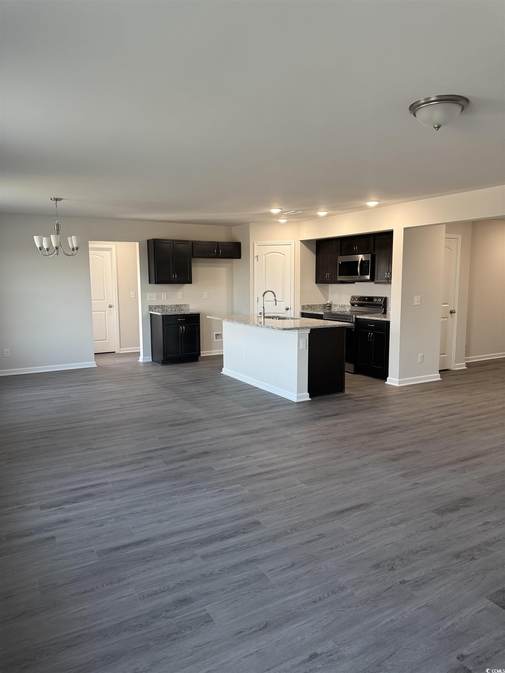 889 Busy Corner Road Conway, SC 29527 - Photo 25 of 25 Kitchen featuring open floor plan, a sink, a notab