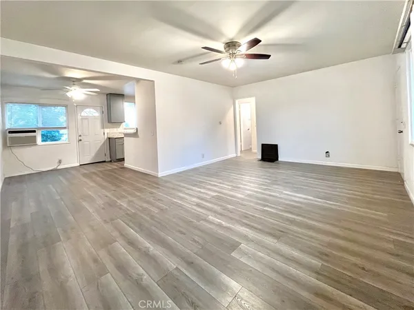 a view of a livingroom with a ceiling fan