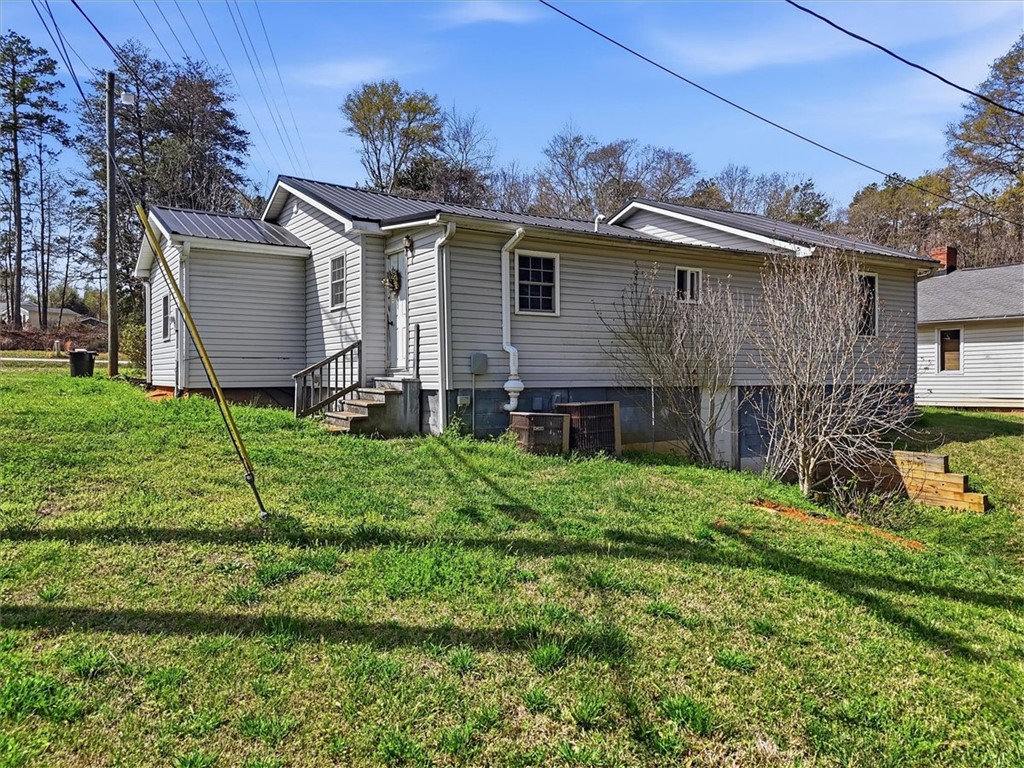 112 Newry Road Seneca, SC 29672 - Photo 19 of 19 This charming home offers a spacious yard and classic architecture, ready for personal touches.