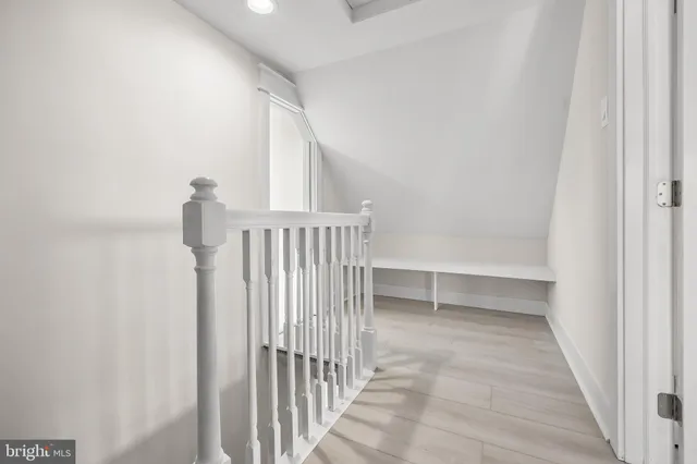 a view of a room with racks on the wall