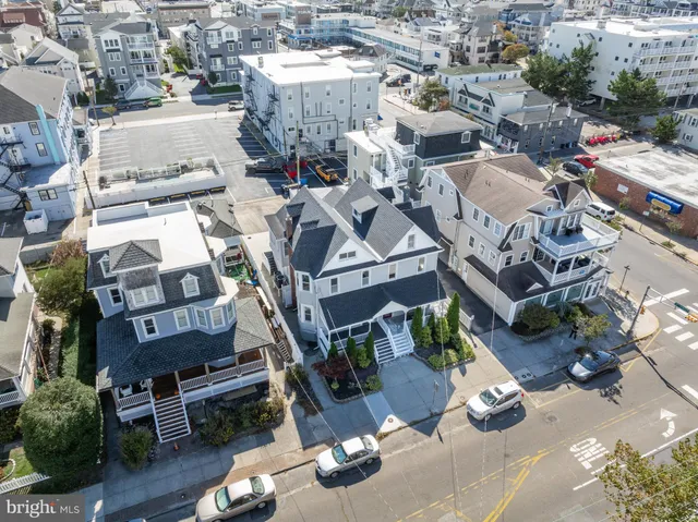 an aerial view of a house with a garden