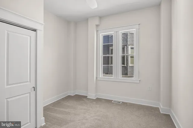 an empty room with windows