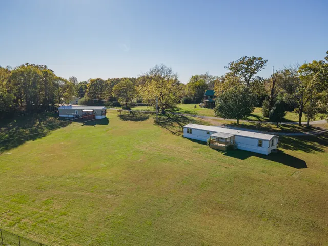 a swimming pool with wooden fence