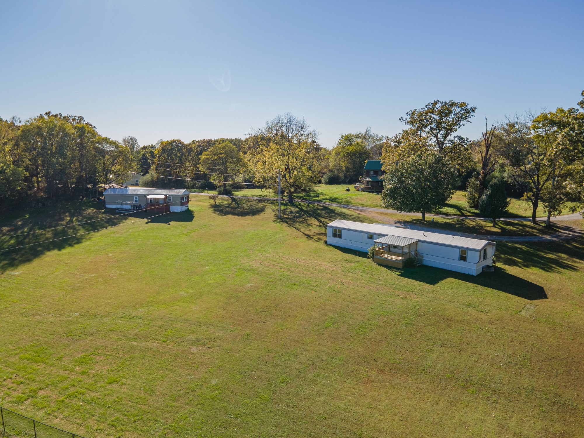 a swimming pool with wooden fence