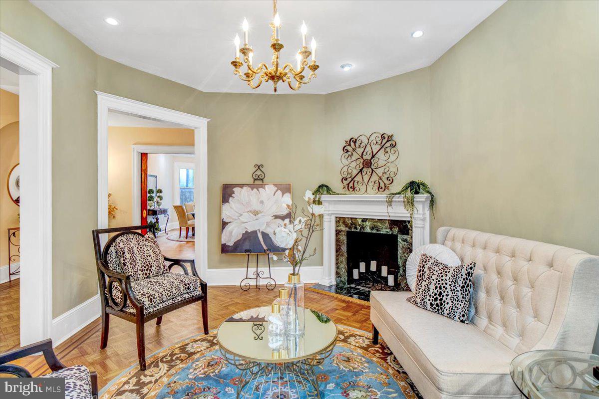1133 Columbia Road Northwest Washington, DC 20009 - Photo 5 of 57 Formal living room with marble faux fireplace