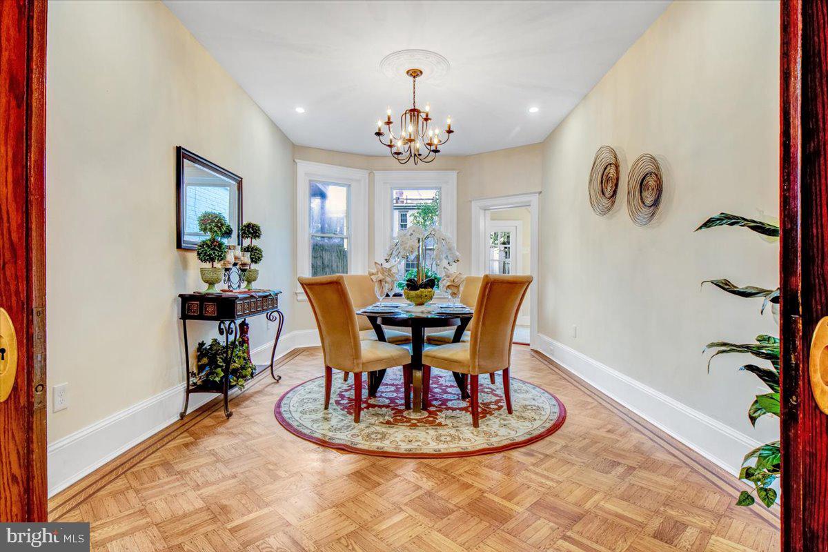 1133 Columbia Road Northwest Washington, DC 20009 - Photo 9 of 57 pocket doors leading to a large formal dining room