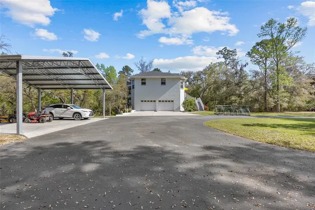 a view of a building with a yard