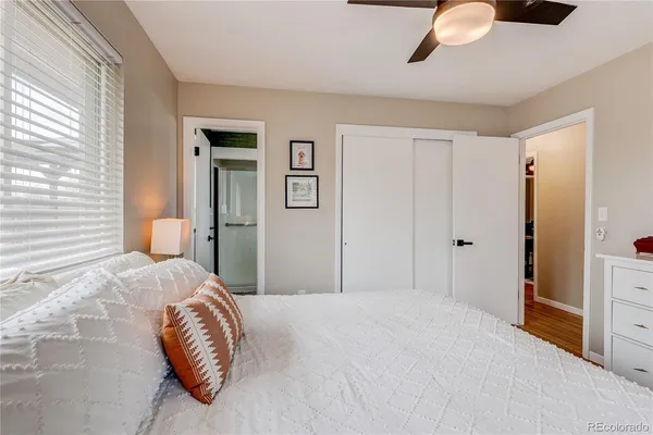 a bedroom with a bed and a cabinets