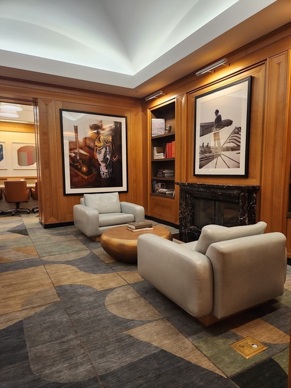 400 Stuart Street, Unit 18K Boston, MA 02116 - Photo 28 of 29 a living room with furniture and a large window