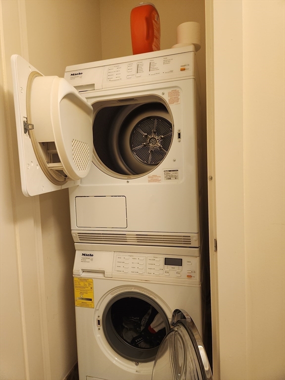 400 Stuart Street, Unit 18K Boston, MA 02116 - Photo 28 of 31 a close up view of a washer and dryer