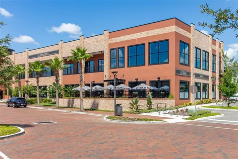 a view of street with sitting area