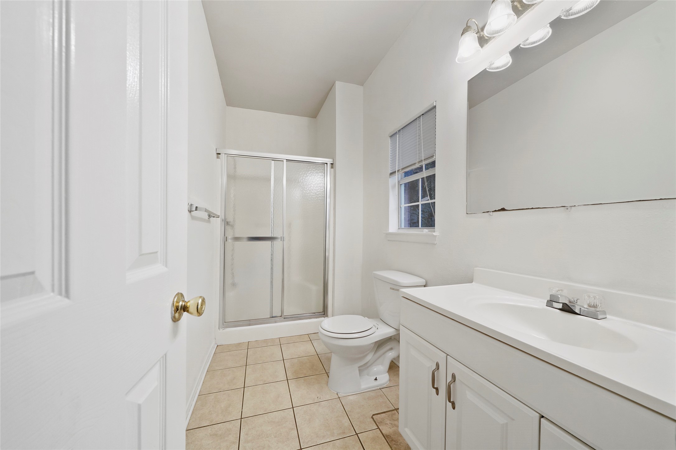 5502 Finch Street, Unit B Houston, TX 77028 - Photo 25 of 37 a bathroom with a sink a toilet and shower