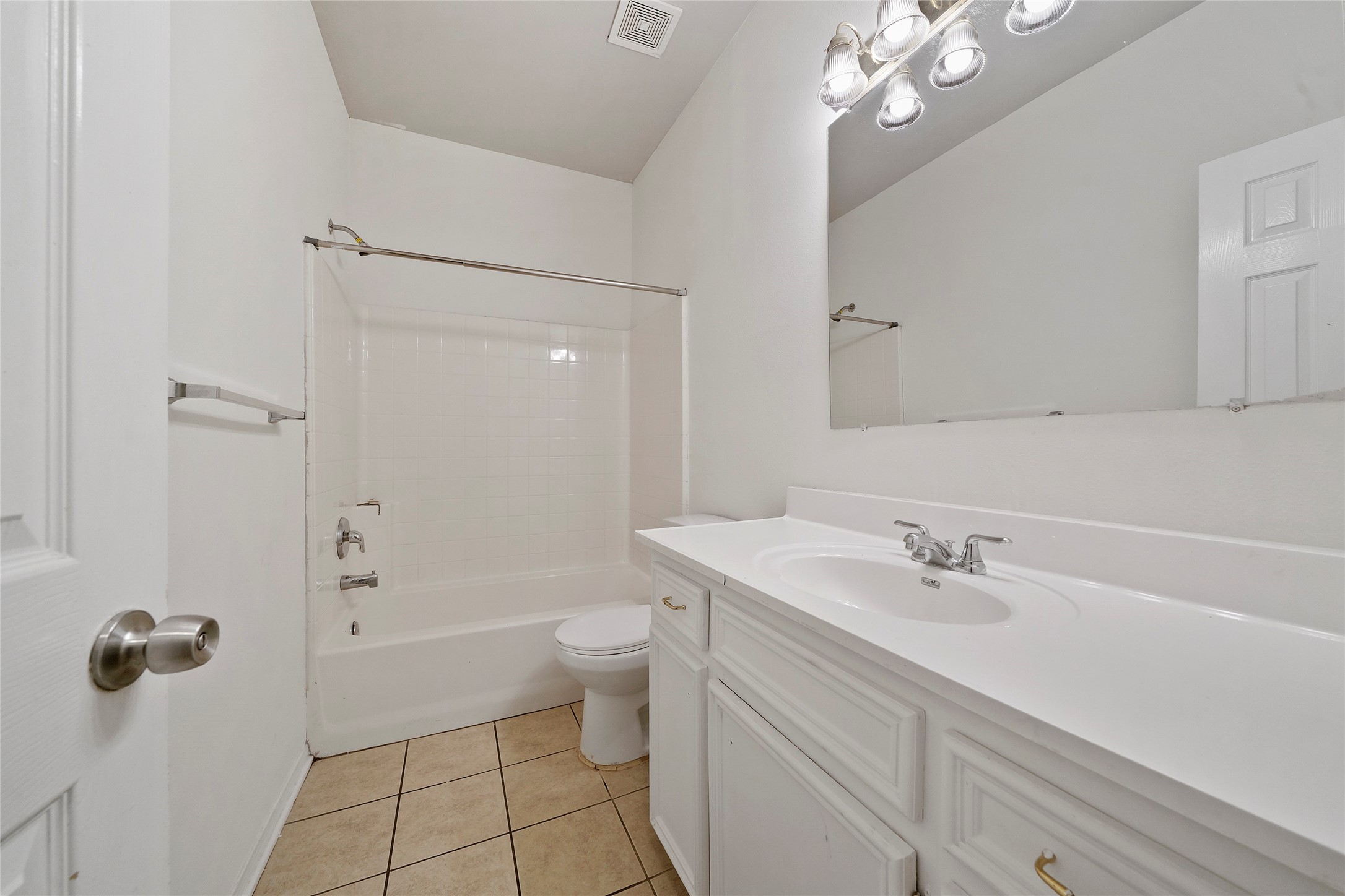 5502 Finch Street, Unit B Houston, TX 77028 - Photo 33 of 37 a bathroom with a sink a toilet and shower