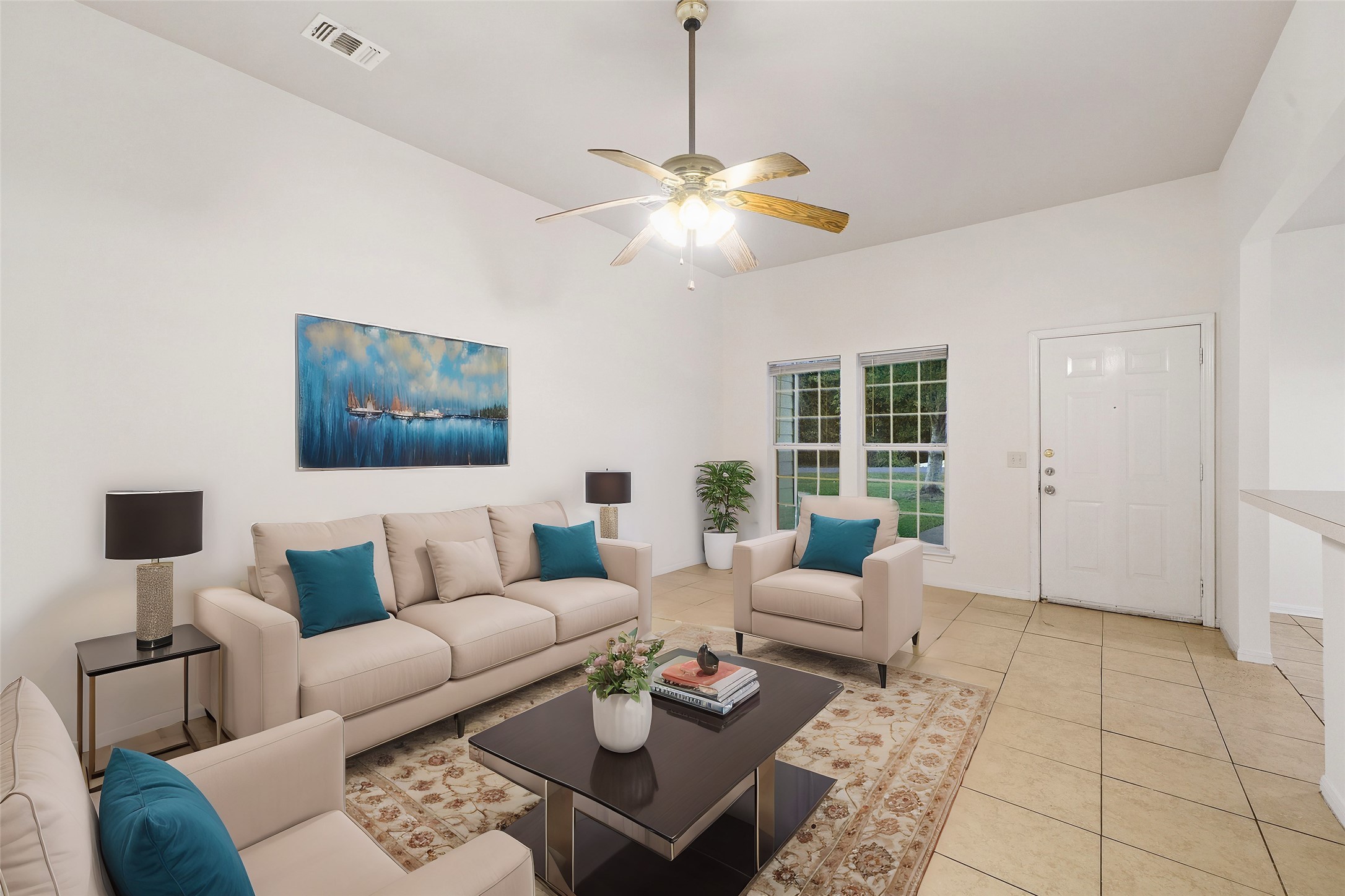 5502 Finch Street, Unit B Houston, TX 77028 - Photo 7 of 37 a living room with furniture a rug and a window