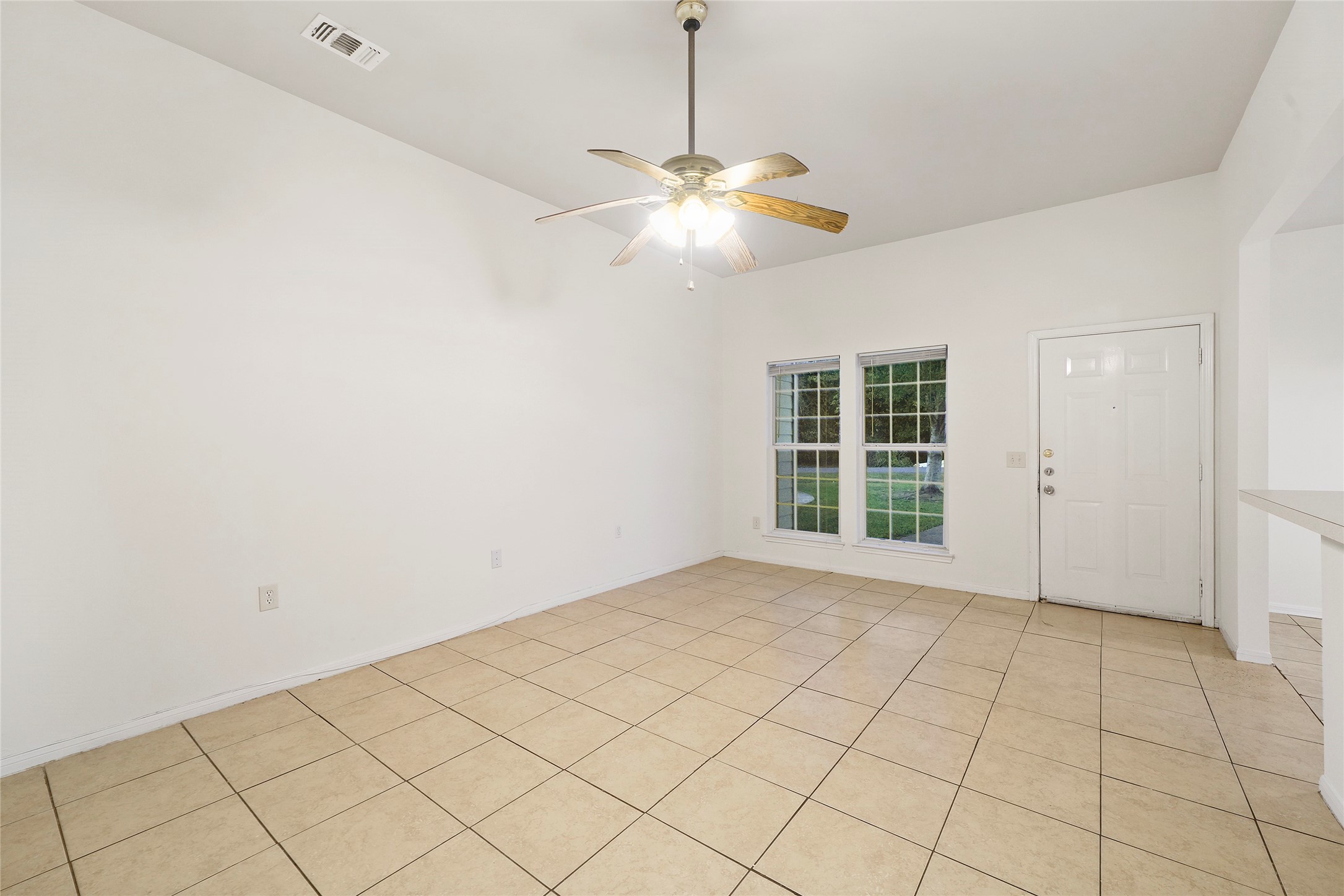 5502 Finch Street, Unit B Houston, TX 77028 - Photo 8 of 37 a view of an empty room with a window