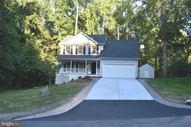 front view of house with a yard