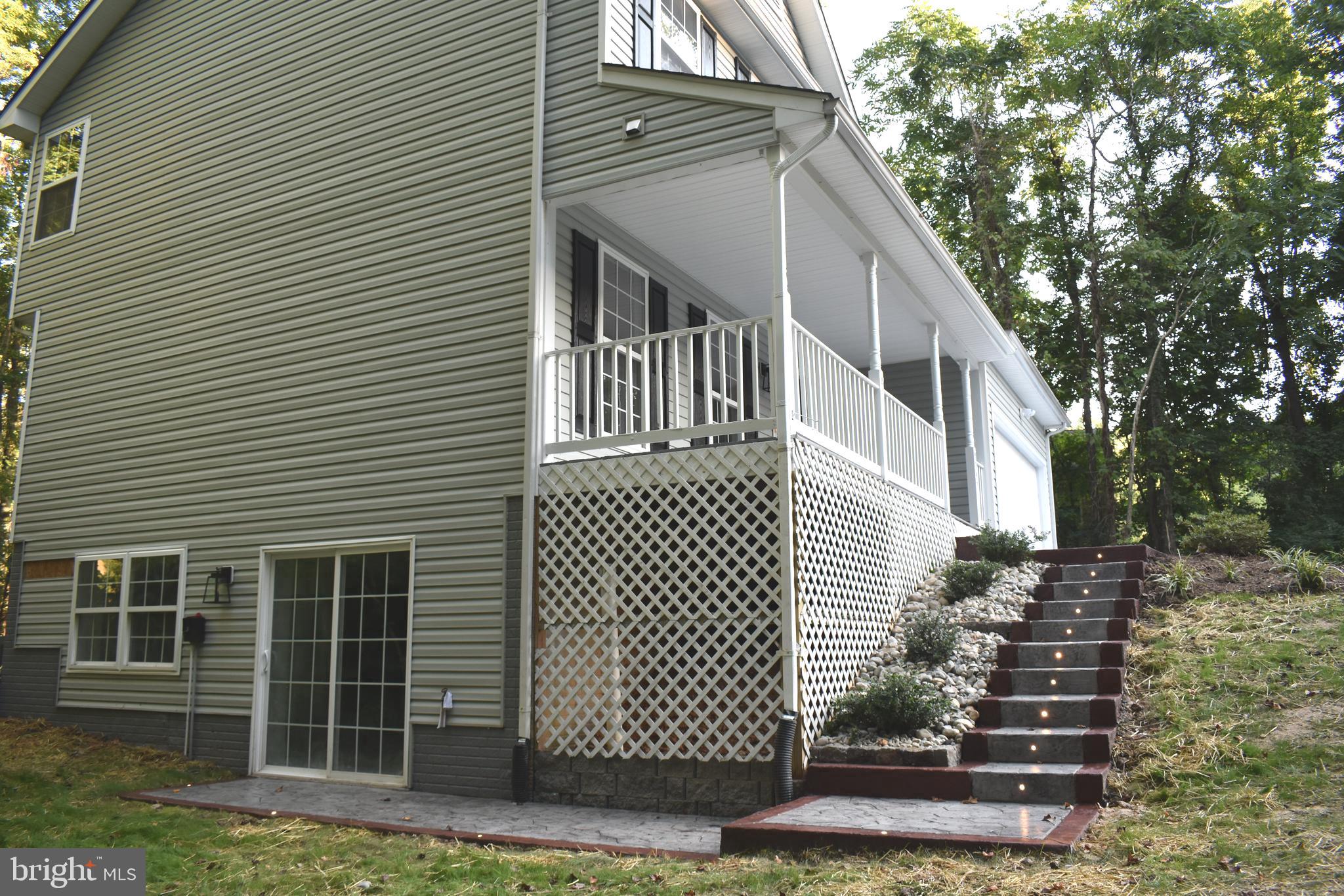 9397 Inaugural Drive King George, VA 22485 - Photo 3 of 37 New Stamp Concrete Sidewalks for easy access