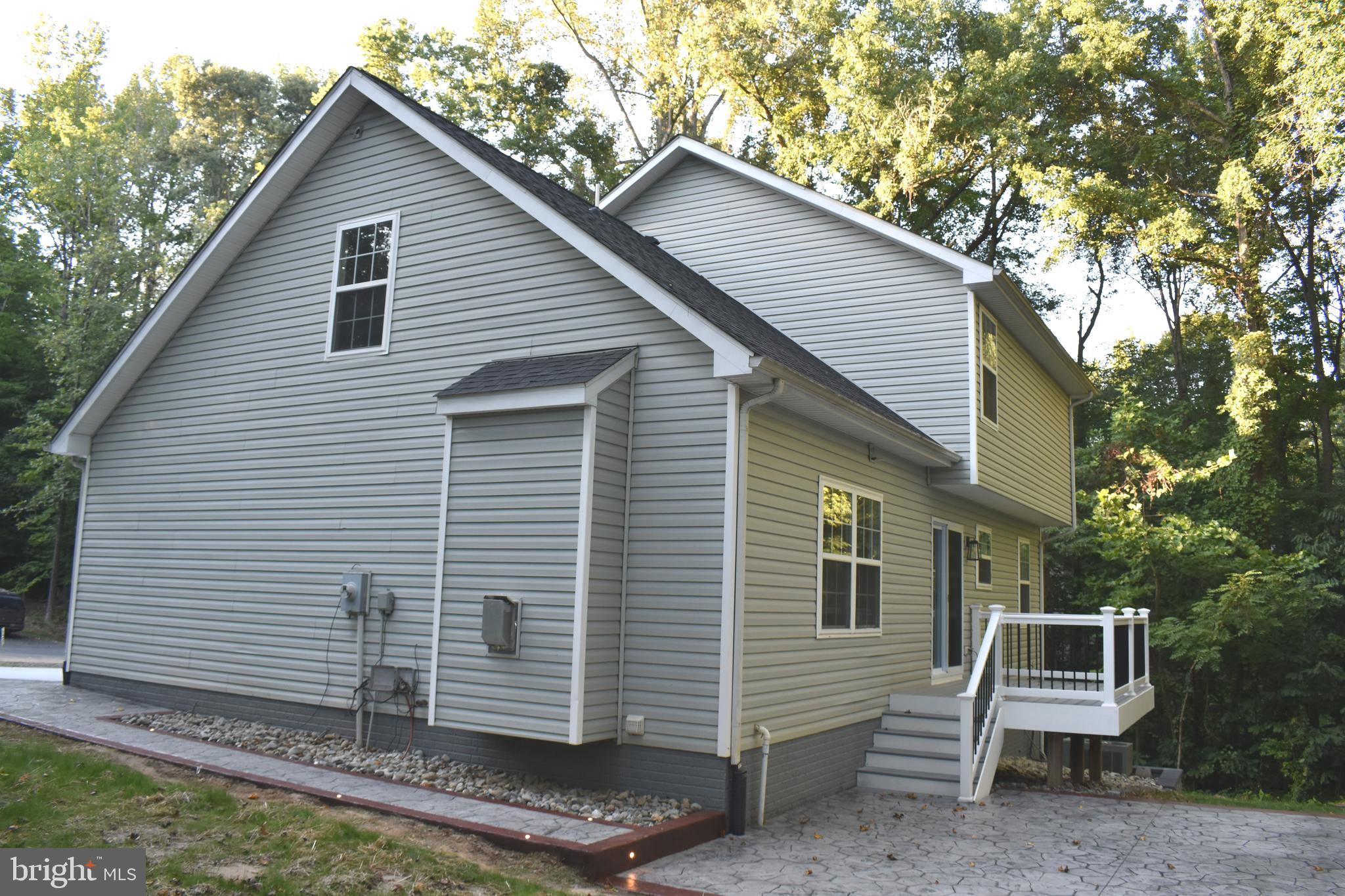 9397 Inaugural Drive King George, VA 22485 - Photo 6 of 37 Illuminate Sidewalk to connect Driveway with Patio