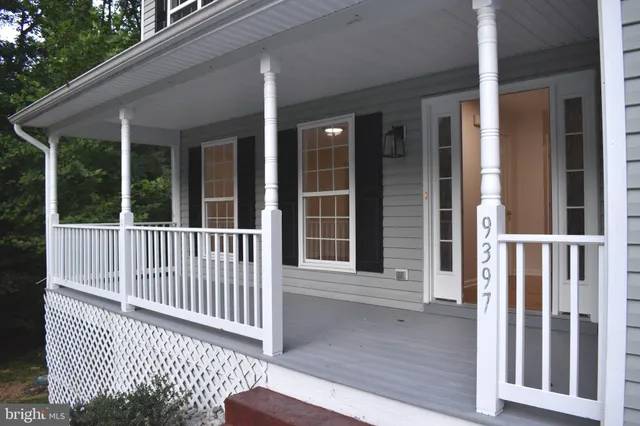 a porch with a chair