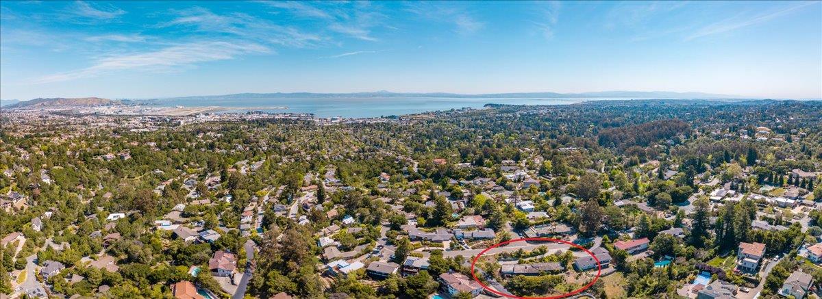 2760 Summit Drive Burlingame, CA 94010 - Photo 5 of 20 an aerial view of house with yard and mountain view in back